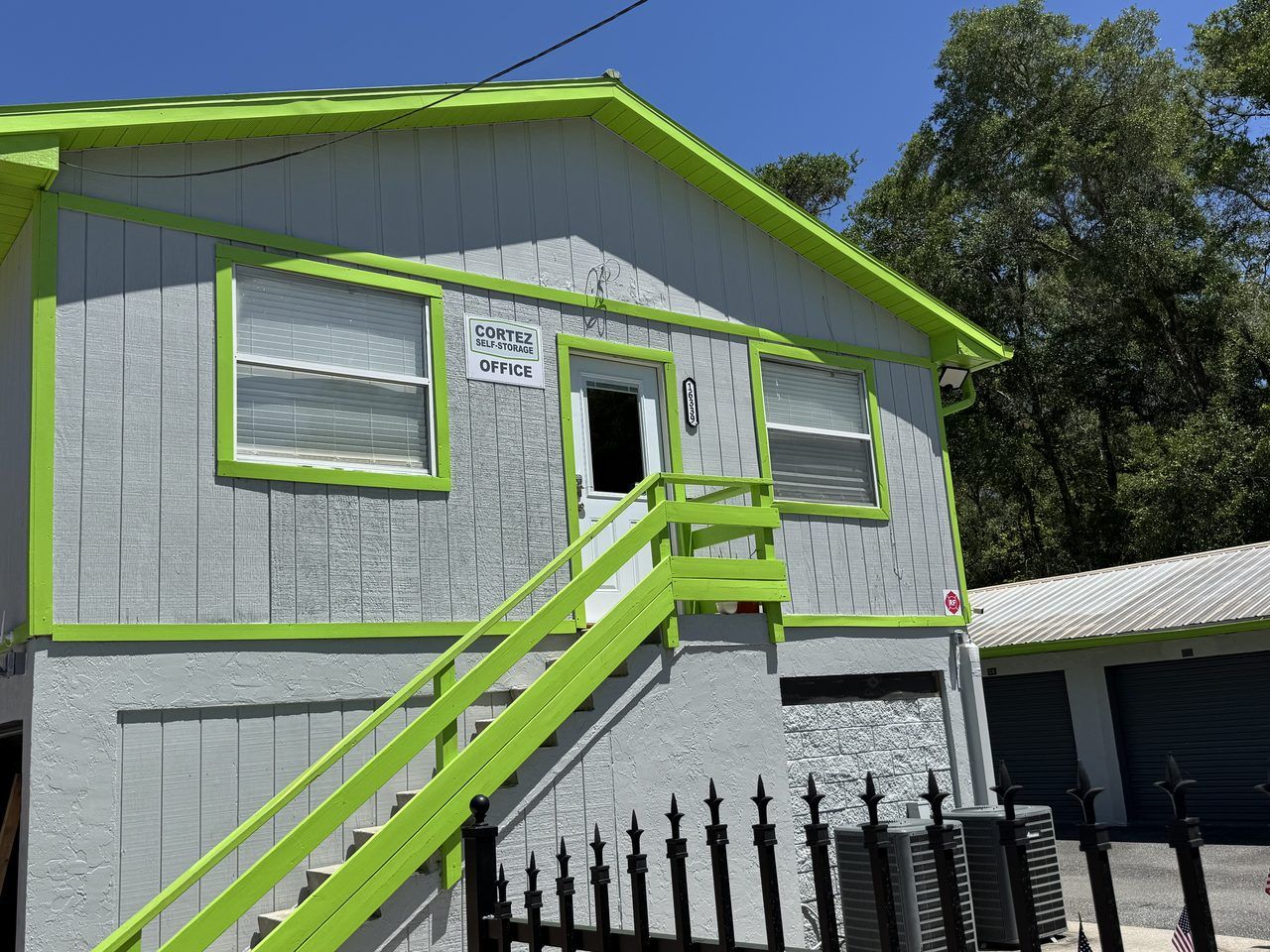 The Cortez Self-Storage office at 16339 Cortez Blvd in Brooksville, FL &mdash; lime-green-trimmed building with &lsquo;Cortez Self-Storage Office&rsquo; sign visible at the entrance.